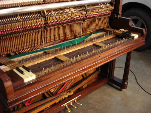 60 - Keys, punchings, blocks, keyslip dry-fitted at both ends of piano